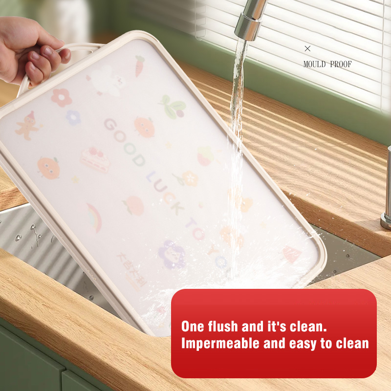 How does the use of high-quality stainless steel to make double-sided cutting boards more hygienic?